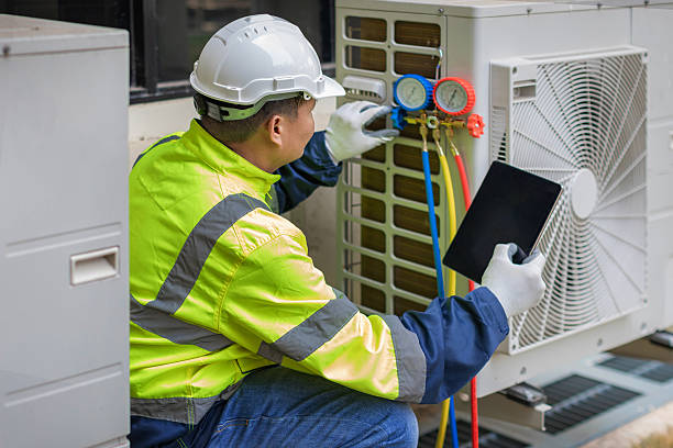 Professional Heat Pump Repair technician working in Kempton, IN